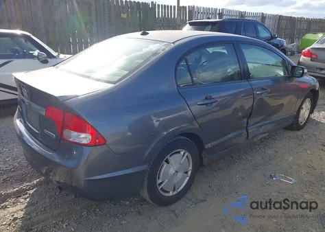 2010 Honda Civic Hybrid from USA, damaged, VIN JHMFA3F23AS003884